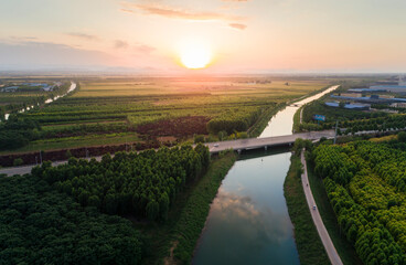 Rural landscape at sunset.