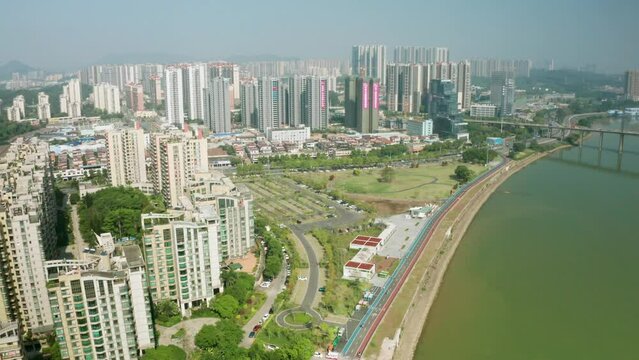 aerial urban residential area marathon park landscape greening real-time video/guangdong jiangmen