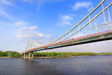 Fototapeta na wymiar Footbridge on Trukhanov Island in Kyiv, Ukraine