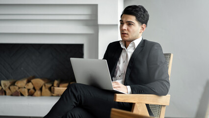 A lawyer in a formal suit responds to a client's letter by mail