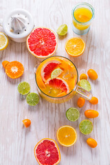 Citrus lemonade or ice tea. Drink with fresh lemons and oranges. Lemon cocktail with juice and ice