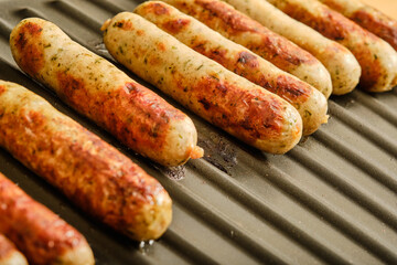 Preparing nuremberg sausages