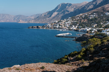 View of Kalymnos island and Mirties village on sunny day. Aegean Sea, Greece.