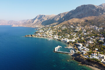 Aerial view of Mirties village on Kalymnos island on sunny day. Aegean Sea, Greece.