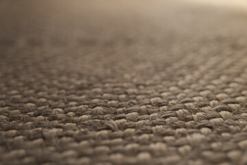 Closeup photo of jute rug on a floor - obrazy, fototapety, plakaty