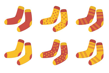 A set of red and yellow autumn socks in a flat style. Vector image.