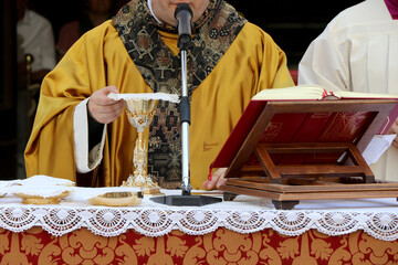 Priest celebrates mass in a Catholic church