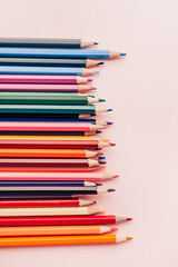 Colored pencil set, sharpened pencils of different colors. Copy space. back to school