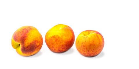 Fruit. Ripe peach fruit highlighted on a white background. Close-up photo.
