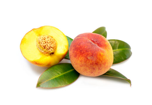 Fruit. Ripe peach fruit highlighted on a white background. Close-up photo.

