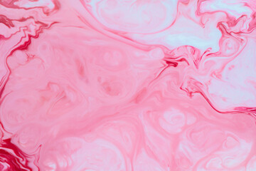 Abstract pink background made with fluid art technique. Liquid colorful backdrop. Fluid art wallpaper