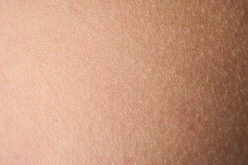 background of a pink skin texture. Healthy skin. Macro photo of skin cells.