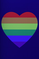 Herz in Regenbogenfarben vor blauem Hintergrund, vertikal, LGBTIQ, Pride Month