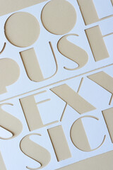 white paper stencil with words: cool, push, sexy, sick