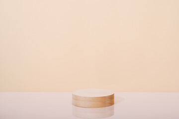Abstract minimal scene with geometric shapes. Cylindrical wooden podium.
