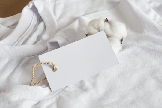 white chlidren t-shirts and blamk white tag, cotton flower and clothes
