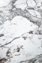 Obraz premium White marble stone texture top view. abstract pattern with grey and brown streaks for background or design art