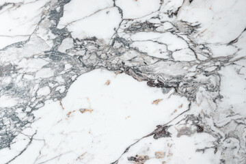 White marble stone texture top view. abstract pattern with grey and brown streaks for background or design art