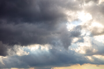 Cloud on blue sky background. Cloudscape grey and orange shade. Twilight light color the cloudy sky