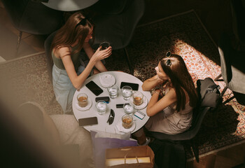 Three girls in a cafe