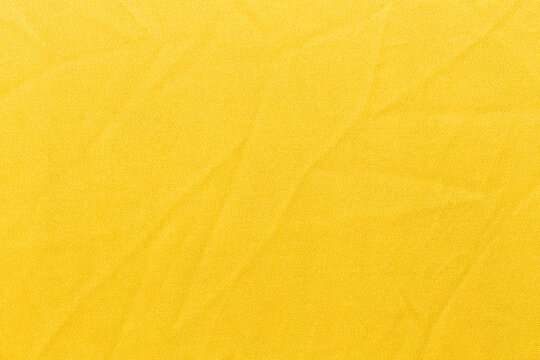 High Resolution Yellow Textile stock textured as background.