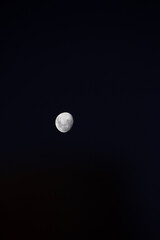full moon over blue sky