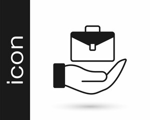 Black Hand holding briefcase icon isolated on white background. Insurance concept. Security, safety, protection, protect concept. Vector