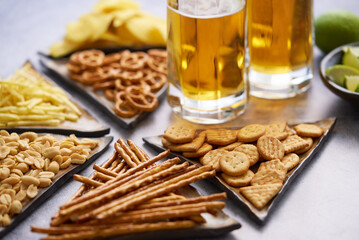 Delicious beer snacks on the table