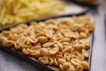 Raw pasta on tray on table