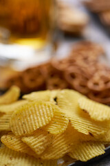 Salty Potato chips served on a plate
