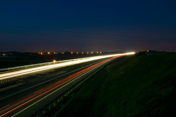 Fototapeta na wymiar lights of cars with night. long exposure