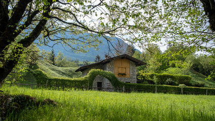 Alpine Hut of Nembia  nature reserve. Naturalistic oasis of Nembia lake in western Trentino Alto Adige - Adamello-Brenta Nature Park - northern Italy