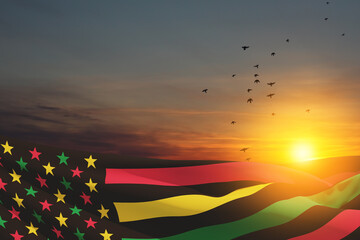 Juneteenth Flag and flying birds on background of sunrise or sunset. Since 1865. Design of Banner...