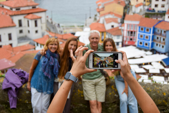 Photo of a family taking with a mobile phone