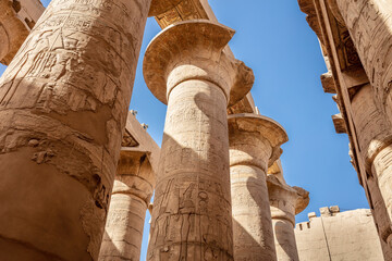 Different hieroglyphs on the walls and columns in the Karnak temple. Karnak temple is the largest...
