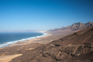 Fototapeta na wymiar View on a volcanic coastline Playa de Cofete Canary Islands 