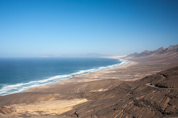View on a volcanic coastline Playa de Cofete Canary Islands 