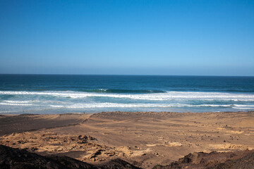 View on a volcanic coastline Playa de Cofete Canary Islands 