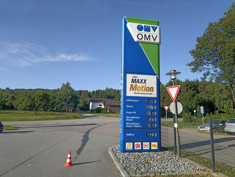 Sign of the network of gas stations OMV against the sky