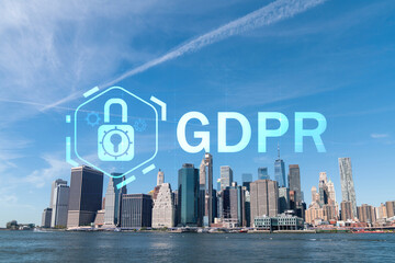 Skyline of New York City Financial Downtown Skyscrapers over East River from park, Dumbo at day time, Manhattan. GDPR hologram, concept of data protection, regulation and privacy for all individuals