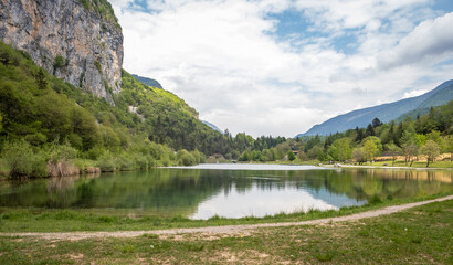 Fototapeta na wymiar Nembia nature reserve. Naturalistic oasis of Nembia lake in western Trentino Alto Adige - Adamello-Brenta Nature Park - northern Italy