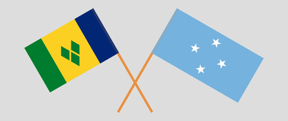 Crossed flags of Saint Vincent and the Grenadines and Micronesia. Official colors. Correct proportion