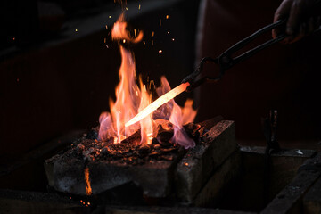 bright fire in the forge with sparks