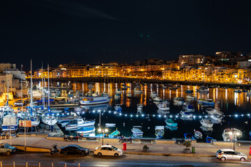 Fototapeta na wymiar Marsaskala Harbour by Night, Marsaskala, Malta, Sept. 2021