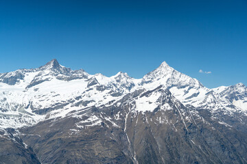 Switzerland's Great Mountains with white snow covered on top of the mountain all year round because of the height and the cold.