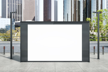 Blank white bus stop billboard on blurry city background. Commercial and ad concept. Mock up, 3D Rendering.