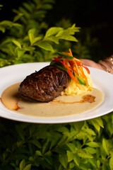 Grilled fish, mashed potatoes, passion fruit sauce, wine