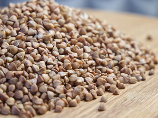 A bunch of buckwheat, side view. Buckwheat close-up. Buckwheat for porridge.