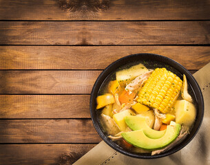 Colombian cuisine - ajiaco soup with chicken and vegetables