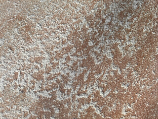 background image a lot of dust on a wooden surface in brown color